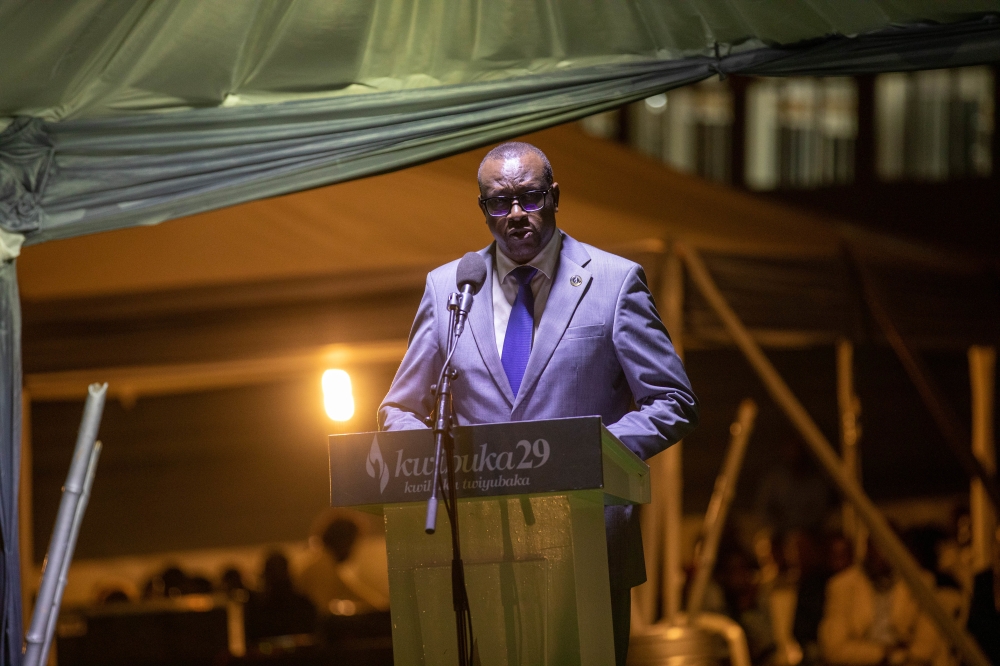 Jean Damascene Bizimana, Minister of National Unity and Civic Engagement addresses mourners  during a commemoration night of Genocide victims laid to rest at Kicukiro Genocide Memorial Site, on April 11.