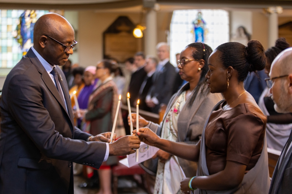 Rwanda’s High Commissioner to the UK, Johnston Busingye, and other Rwandans at the event to mark the 29th Commemoration of the 1994 Genocide against the Tutsi, on Wednesday, April 12, at St Marylebone Parish in London.