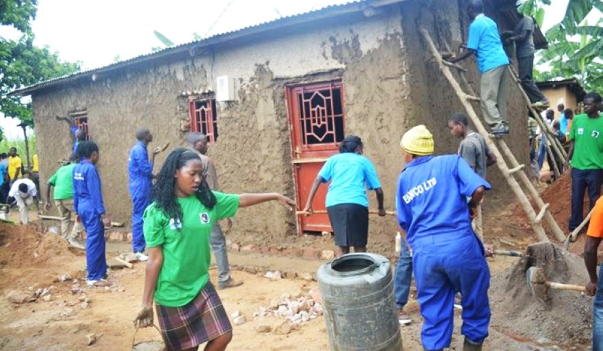 Youth renovate a house of a genocide survivor in Rwamagana. At least Rwf11 billion has been allocated for the renovation of housing units for vulnerable survivors of the 1994 Genocide against the Tutsi: Photo: Courtesy.