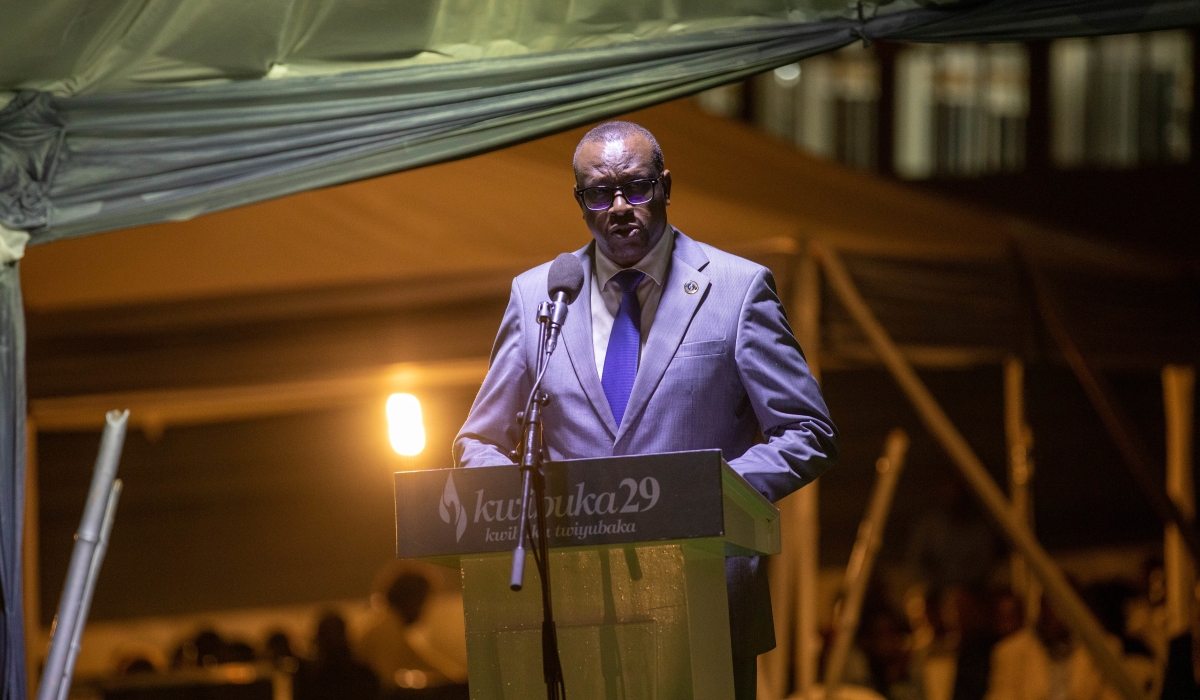 Jean Damascene Bizimana, Minister of National Unity and Civic Engagement addresses mourners  during a commemoration night of Genocide victims laid to rest at Kicukiro Genocide Memorial Site, on April 11.