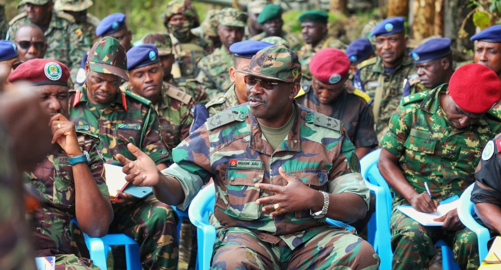 Angolan Lt Gen Nassone João, head of the ad-hoc verification mechanism (AVM) comprising officers from Angola, Rwanda, and DR Congo talks to the Commander of EACRF, Maj Gen Jeff Nyagah and other members of the Joint Bureau comprising the AVM, EACRF, EJVM and EAC-MVM.
