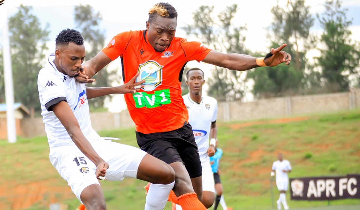 APR FC and Gasogi United players battle for the ball during a goalless draw at Bugesera Stadium on April 15. Courtesy