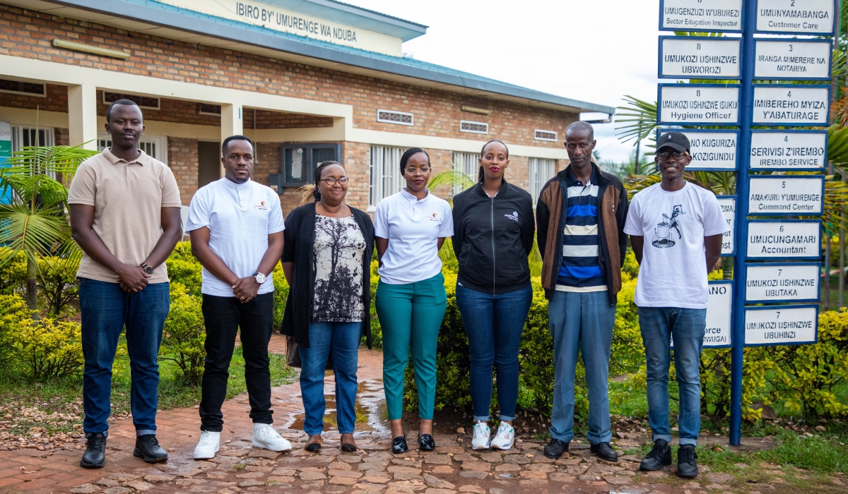 Cogebanque officials pose for group photo during the visit of vulnerable genocide survivors in  Nduba on April 14 2023 photo by Dan Gatsinzi