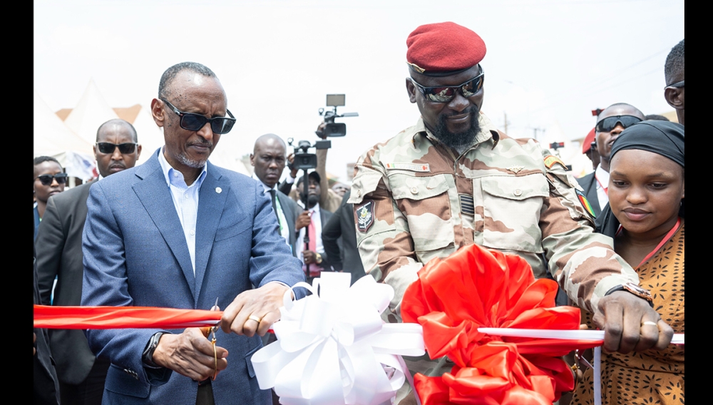 President Kagame and his host Col. Mamadi Doumbouya cutting a ribbon during the inauguration of the highway interchange.Photos: VIllage Urugwiro