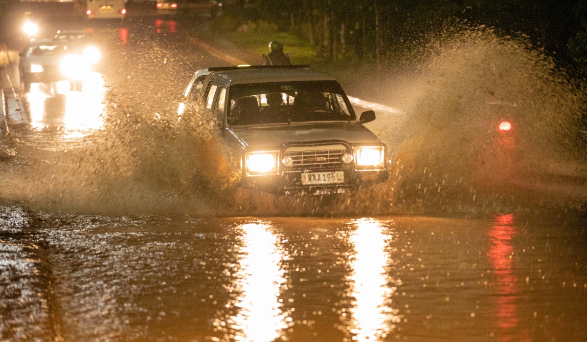 A motorist navigates through floodwater near Nyabugogo Bus Park on March 1, 2020. Photo. File