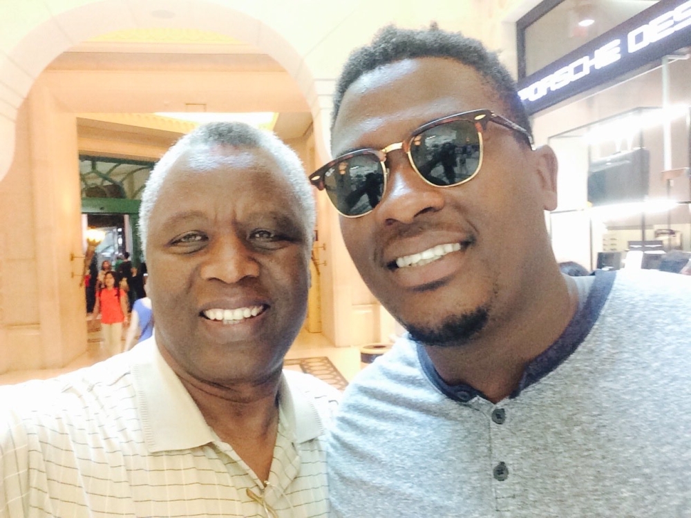 Archbishop Mbanda and his son Edwin.