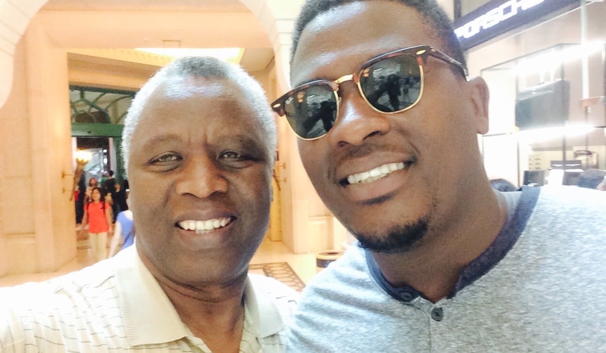 Archbishop Mbanda and his son Edwin.