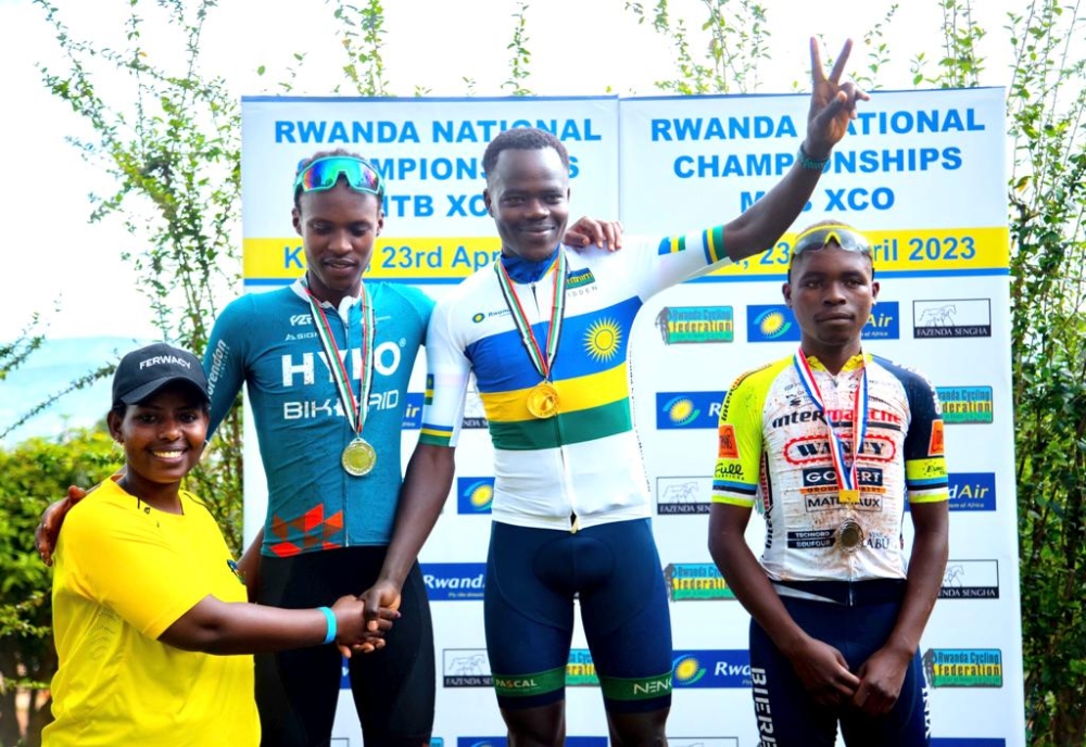 Habimana (c) celebrates his Mountain Bike triumph