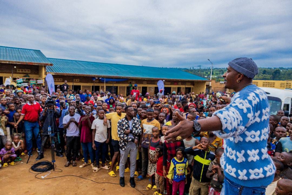 Artiste Platini entertaining  hundreds of youth who gathered at Rukomo market in Rukomo sector, Nyagatare District on April 21.