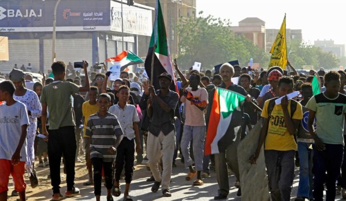 Sudanese protesters take part in a demonstration in southern Khartoum on April 6, (AFP)