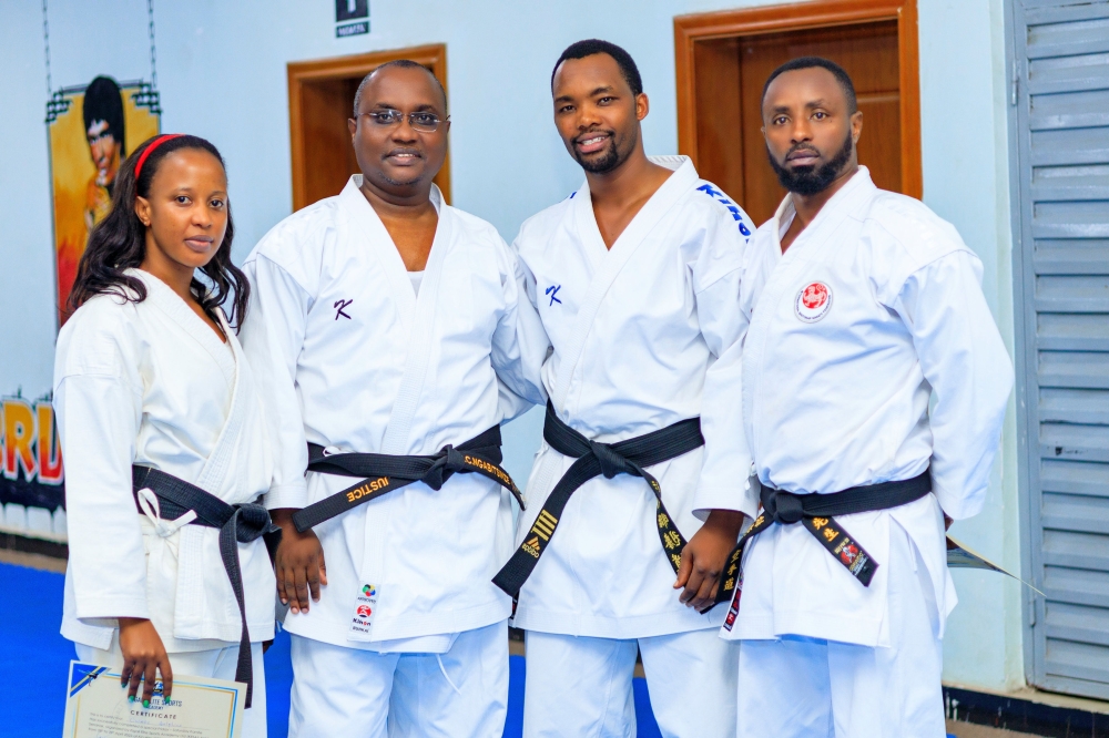 Rwandan movie star Delphine Uwase (Soleil), Minister of Trade and Industry, Jean-Chrysostome Ngabitsinze, the CEO of KESA, Jean-Claude Nkurunziza, and national Karate referee, Fabrice Gahizi, pose for a picture after James Opiyo&#039;s class in Kigali, on Saturday, April 29, 2023.
