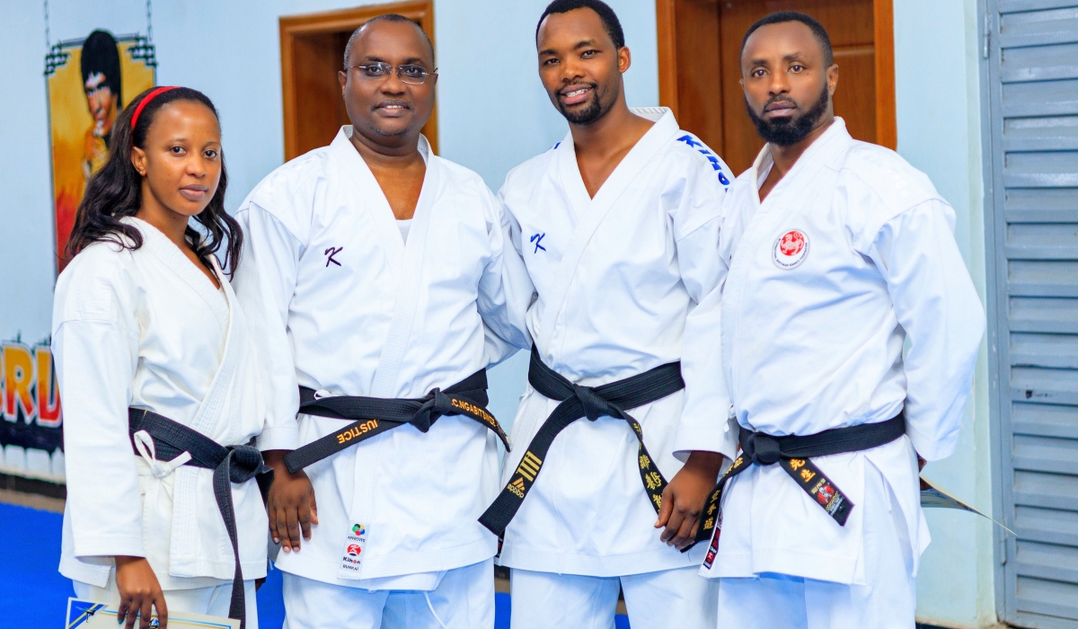 Rwandan movie star Delphine Uwase (Soleil), Minister of Trade and Industry, Jean-Chrysostome Ngabitsinze, the CEO of KESA, Jean-Claude Nkurunziza, and national Karate referee, Fabrice Gahizi, pose for a picture after James Opiyo&#039;s class in Kigali, on Saturday, April 29, 2023.