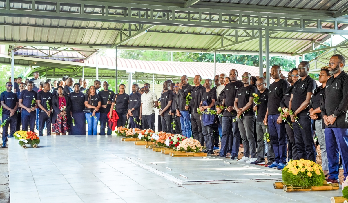 The group lays wreaths and pays homage to the individuals buried at the memorial site.