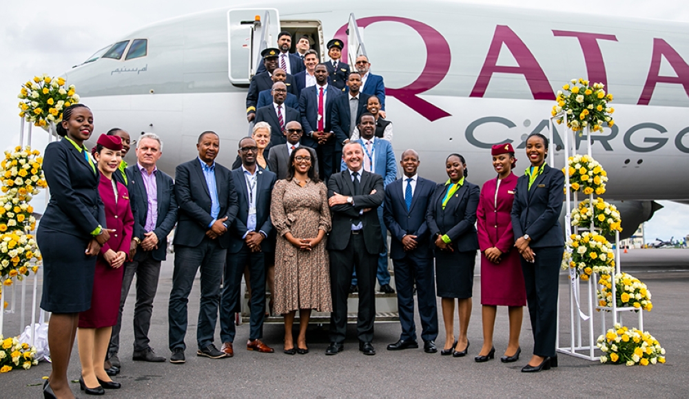 The Chief Executive Officer of RwandAir Yvonne Makolo (centre) with Guillaume Halleux, Qatar Airways Chief Officer of
Cargo (5th right), flanked by other officials during the launch of the new African cargo hub at Kigali International Airport,
on May 3. The hub is aimed at boosting trade within the continent and across overseas markets. Photo: Olivier Mugwiza.
