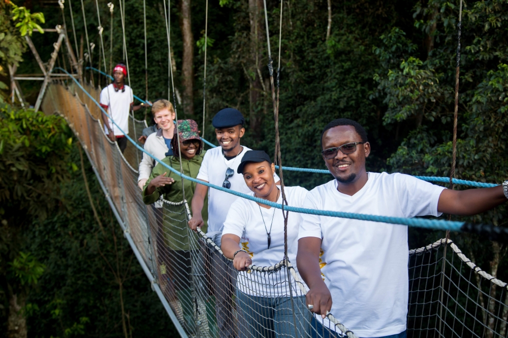 Some tourists on Nyungwe Forest&#039;s canopy walkway. Sam Ngendahimana