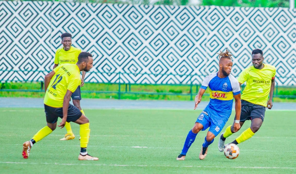 Cameroonian forward Leandre Willy Onana Essomba wins the ball against Mukura VS defenders as the Blues beat Mukura 3-2 at Huye stadium on May 10. Courtesy