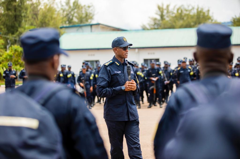 Vincent Sano, the Deputy Inspector General of Police in charge of Operations addresses Police officers before they departed for Central African Republic (MINUSCA), and South Sudan (UNMISS). Courtesy