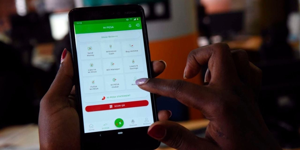 A user sending money on M-Pesa. Photo_NMG