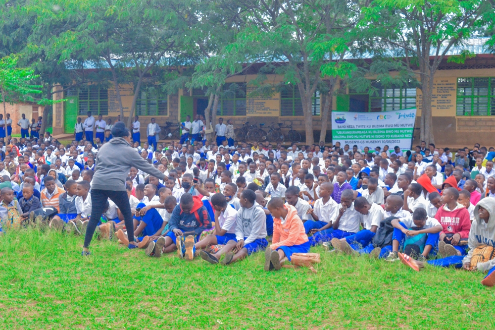 Anathalie Uwizeyimana, a Psychologist gives remarks to students at Musenyi Technical Secondary School (TSS) on mental health awareness.