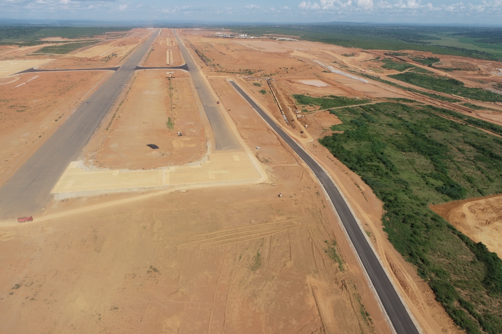 A section of the airport showing the nearly complete runway, taxiway, and internal road. Aviation Travel and Logistics (ATL).