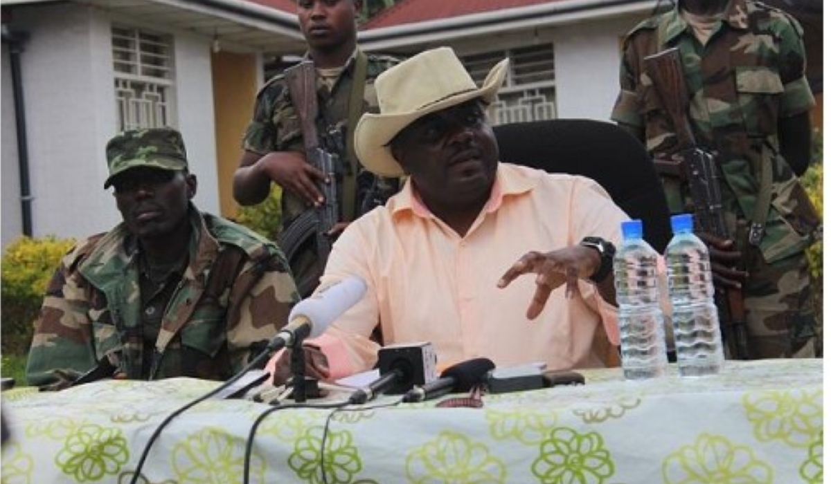 Bertrand Bisimwa, president of the M23 rebel group, addresses journalists in eastern DR Congo, as Gen Sultani Makenga, the group&#039;s military commander (left), looks on. Courtesy.