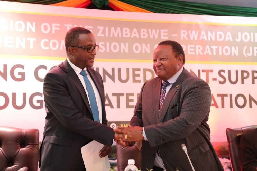 Minister of Foreign Affairs, Dr Vincent Biruta and  Minister of Foreign Affairs and International Trade, Frederick M. Shava during the second  Session of the Zimbabwe-Rwanda  Joint Permanent Commission on Cooperation in Harare.