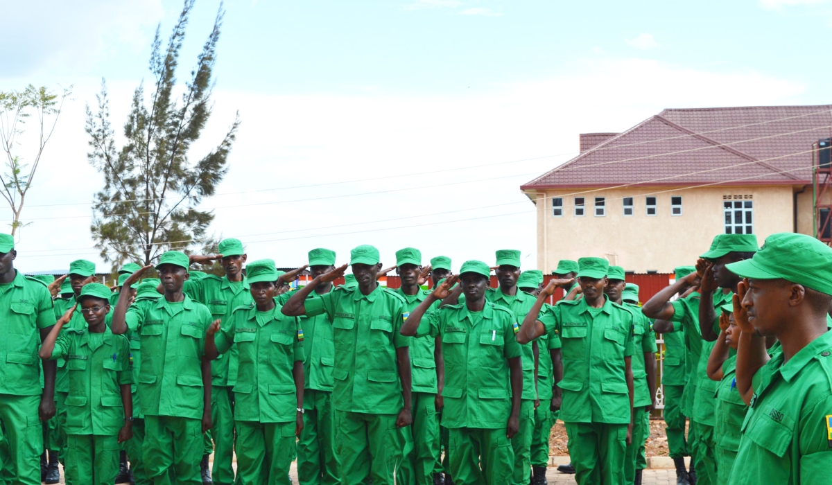 Members of  District Administration Security Support Organ (DASSO) officers during a parade. The government has announced new reforms to improve the performance of DASSO. Sam Ngendahimana