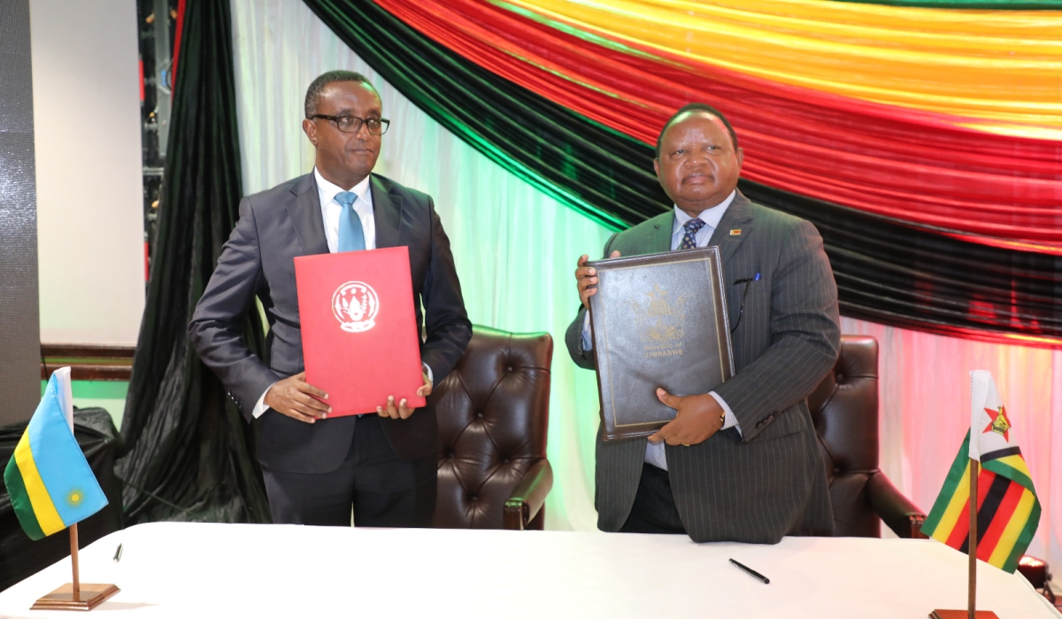 Minister of Foreign Affairs, Dr Vincent Biruta and  Minister of Foreign Affairs and International Trade, Frederick M. Shava during the signing ceremony in Harare on Tuesday, May 16. All photos/ Kelvin Jakachira.