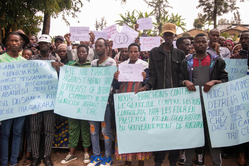 Refugees during a peaceful protest against the ongoing atrocities against Tutsi in DR Congo, at Kigeme refugee camp in Nyamagabe District, on December 12, 2022. Photo by Willy Mucyo