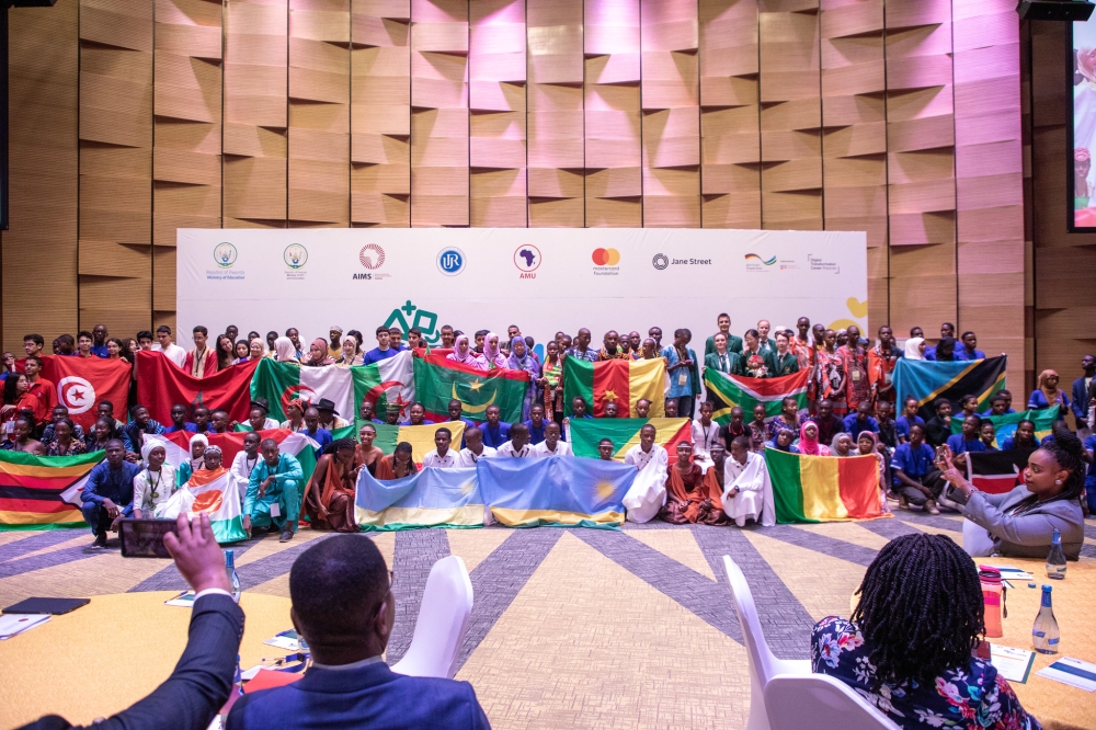 Delegates from across Africa pose for a group photo at the  30th edition of the Pan-African Mathematics Olympiad that is taking place in Kigali at Intare Conference Arena on Tuesday, May 16. Dan Gatsinzi