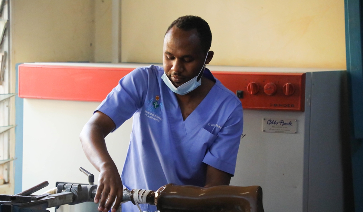 A medic fixes a prosthesis which is an artificial body part used to replace a damaged part for the affected person, at Inkuru nziza Hospital. Over Rwf7bn more needed to cover prostheses for people with disabilities. Bahizi