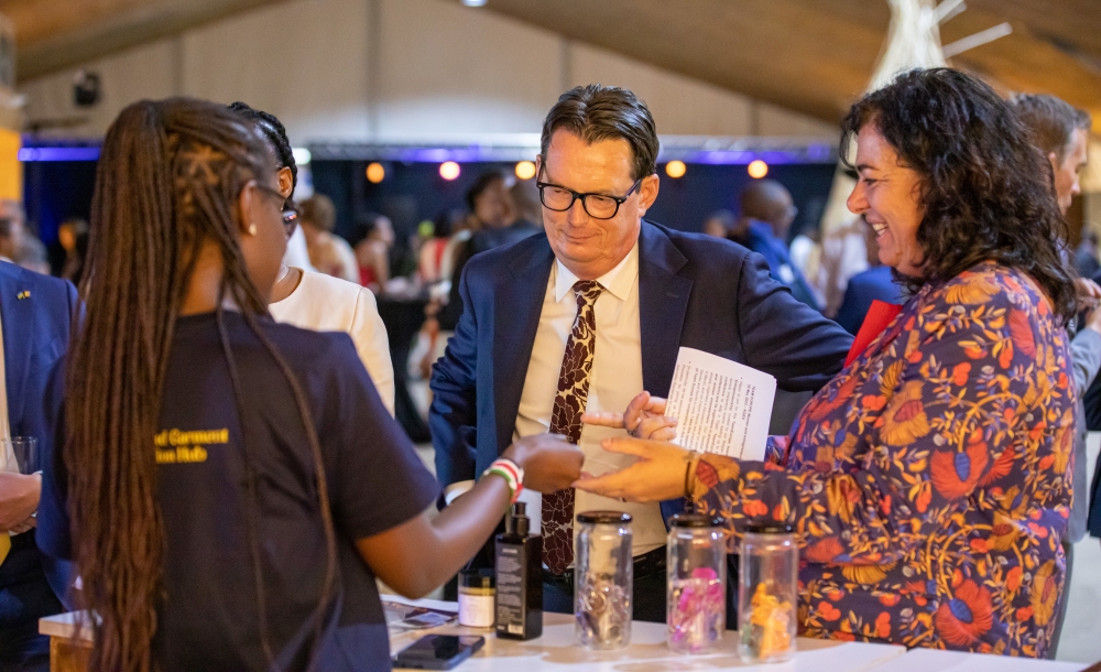 Visitors tour a booth at the event organised to showcase creativity of women entrepreneurs in Rwanda’s cultural and creative sectors. Photo: Willy Mucyo.