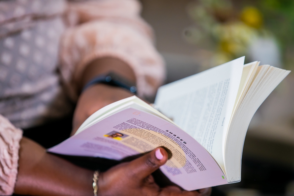 Several studies suggest that reading a hardcover book yields more comprehension than reading  online. Photo by Olivier Mugwiza.