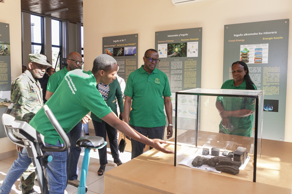 Minister Bizimana flanked by other officials during a guided tour of the newly inaugurated museum in Karongi District  on Thursday, May 18. Photos by Christianne Murengerantwari