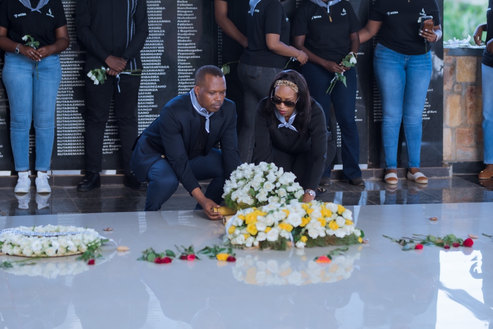 NCBA Rwanda CEO, Lina Higiro, and NCBA Rwanda Head of Operations, Christian Dingida, lay a wreath to pay respects to the victims of the 1994 genocide against the Tutsi at Ntarama Genocide Memorial, May 19, 2023 (courtesy)