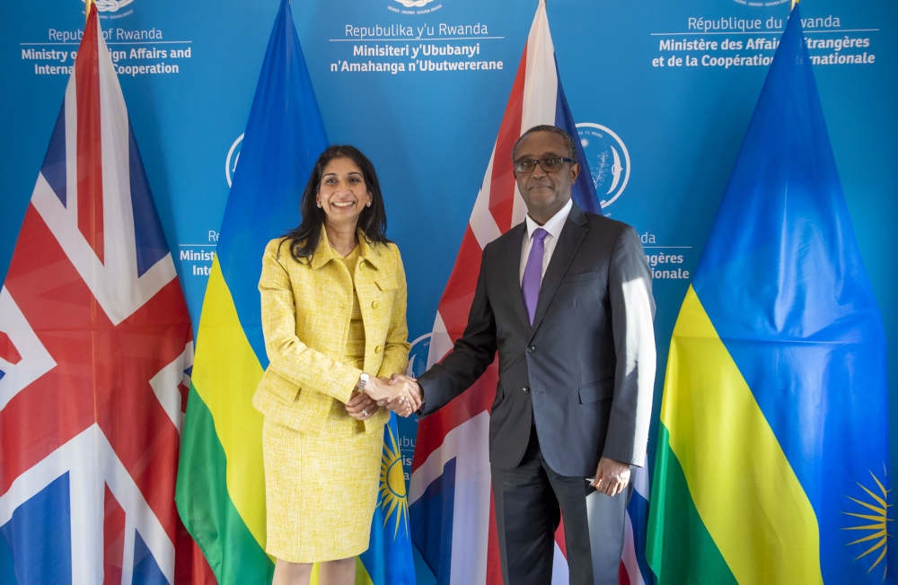The UK Home Secretary Suella Braverman shakes hands with Minister of Foreign Affairs and International Cooperation Dr Vicent Biruta during a bilateral meeting in Kigali on March 18, 2023. Craish Bahizi