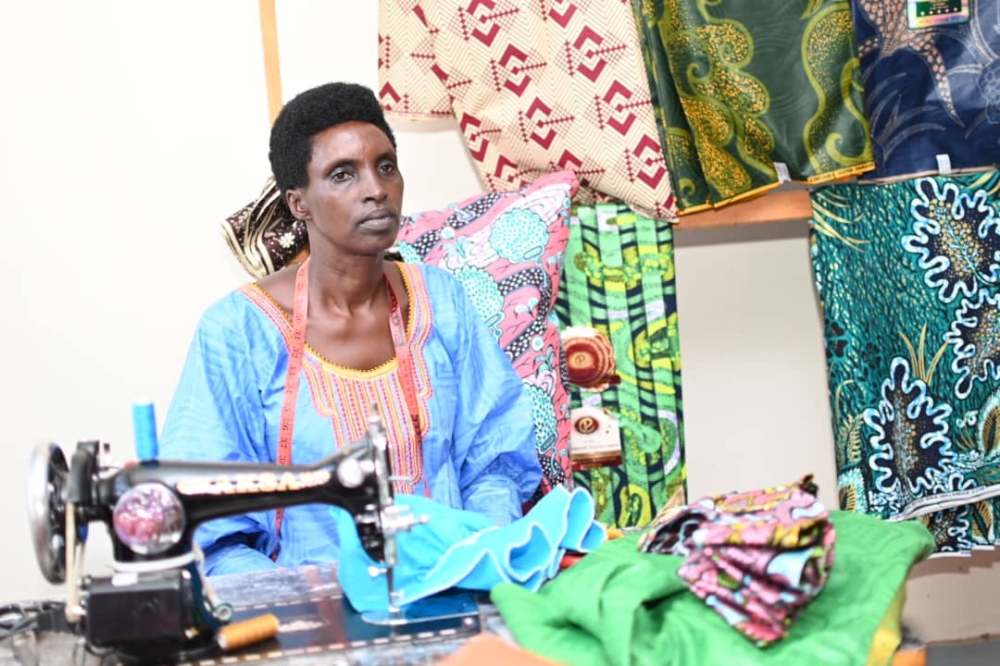 Mathilde Mukayiranga, president of Twitezimbere Abadozi-a tailoring cooperative comprising 46 members of whom 30 are refugees in Mugera cell of Gatsibo sector