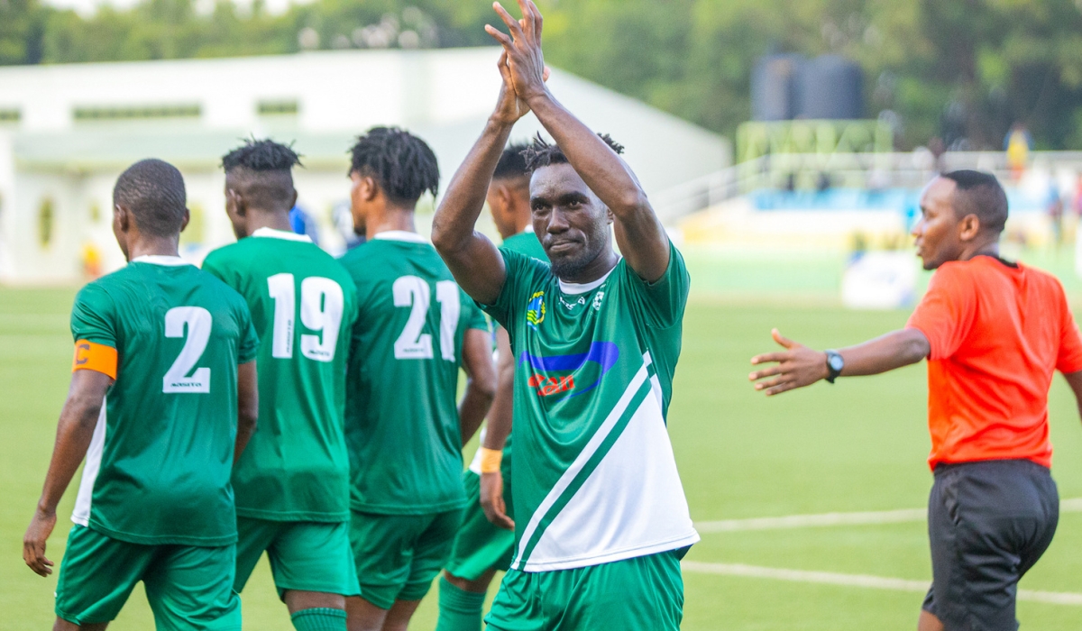 SC Kiyovu striker Erisa Ssekisambu applauds for the Green Baggies supporters after scoring a goal during  a league tie. The attacker Ssekisambu was left dejected after his penalty miss during Sunday’s 1-0 defeat to Sunrise
