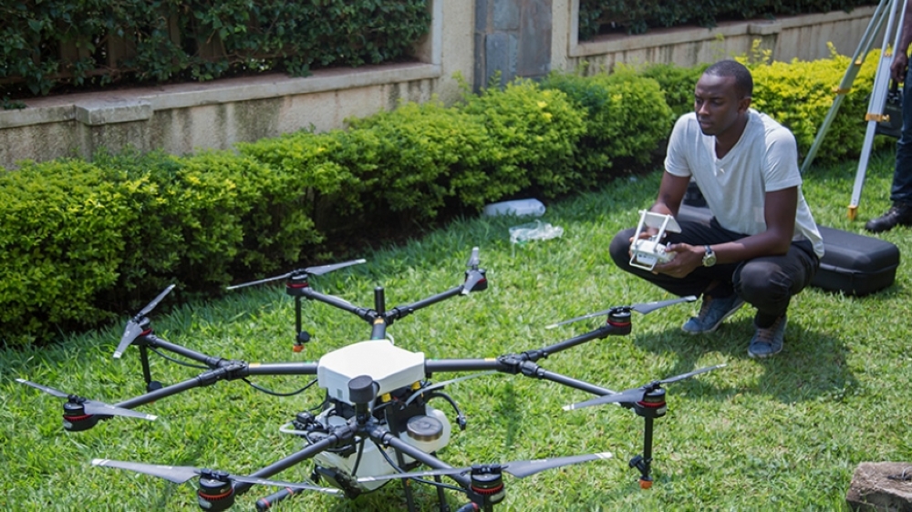Teddy Segore, one of the pilots with Charis test-flies a drone in Kigali . File