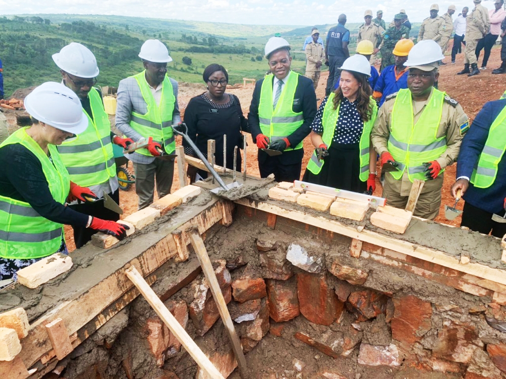 Officials lay a foundation stone during the launch of the construction works on halfway houses  in Rwamagana District  on Thursday, May 25. Photos by Emmanuel Nkangura