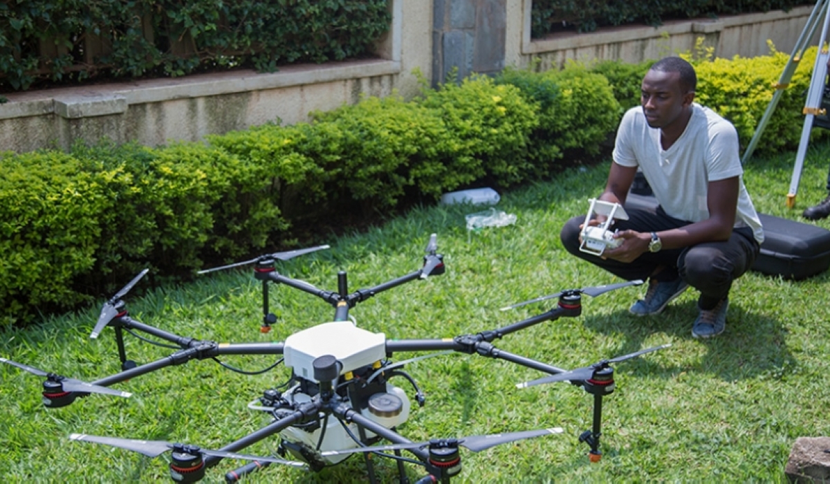 Teddy Segore, one of the pilots with Charis test-flies a drone in Kigali . File