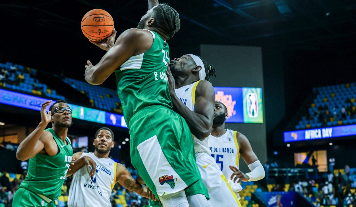 AS Douanes players vie for the ball with Petro de Luanda&#039;s giants  during the game . The Senegal based team stun Angola&#039;s  92-86  in the semi-finals on Wednesday at BK Arena. All Photos by Olivier Mugwiza.