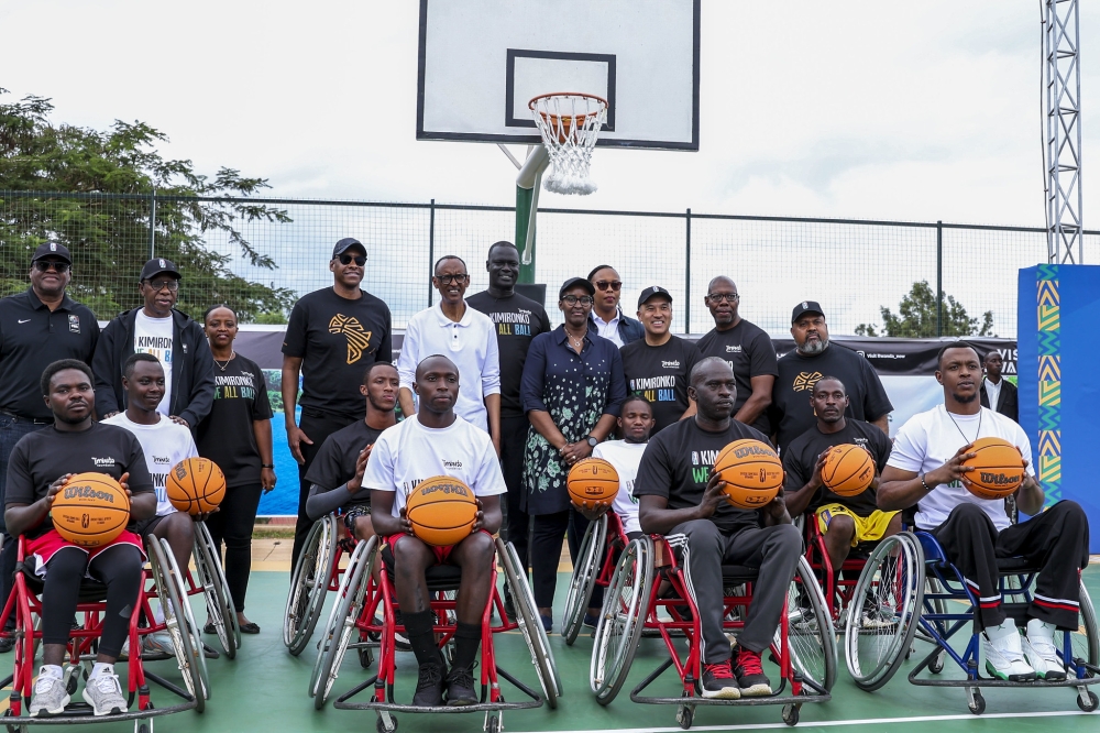 President Paul Kagame and First Lady Jeannette Kagame in a group photo during  the inauguration of Kimironko basketball court on Saturday, May 27.  Photos by Olivier Mugwiza