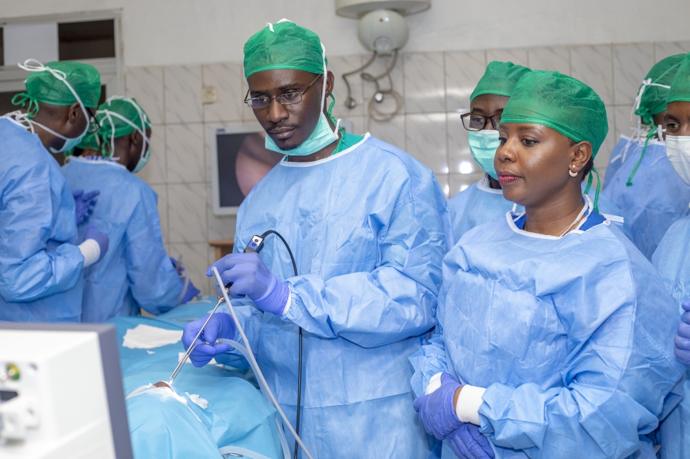 Medics during an operation at Kacyiru Hospital. The new reforms include producing more healthcare workers and retaining. Craish Bahizi