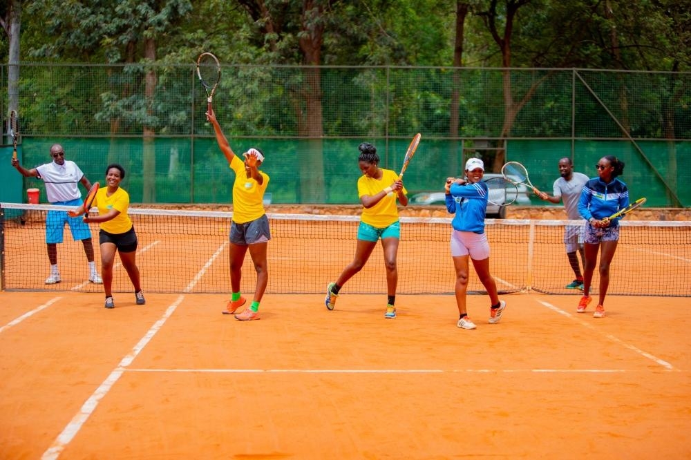 Rwandan Tennis players who will compete at  Billie Jean King Cup tennis tournament  in Kigali, during a training session. Courtesy