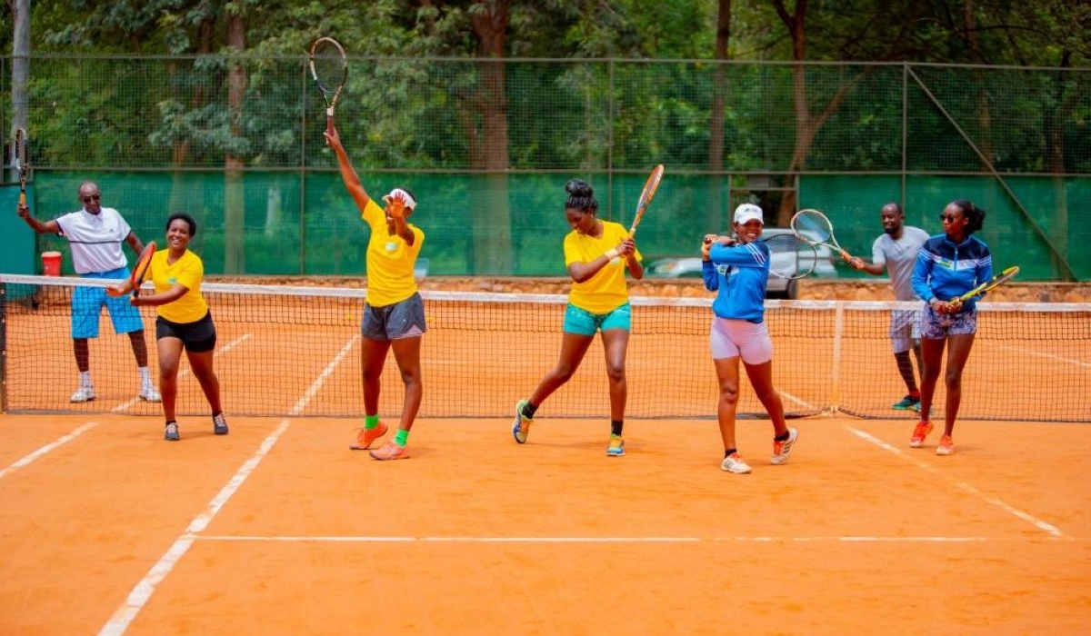 Rwandan Tennis players who will compete at  Billie Jean King Cup tennis tournament  in Kigali, during a training session. Courtesy