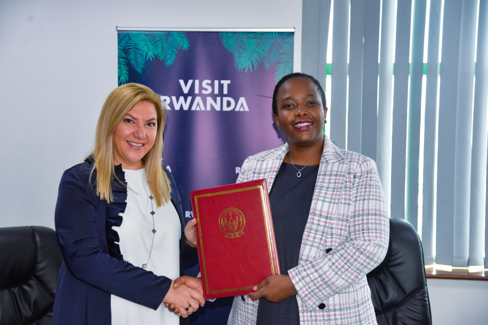 TIME Global CRO, Viktoria Degtar (L) and RDB CEO, Clare Akamanzi (R) after signing the partnership agreement today