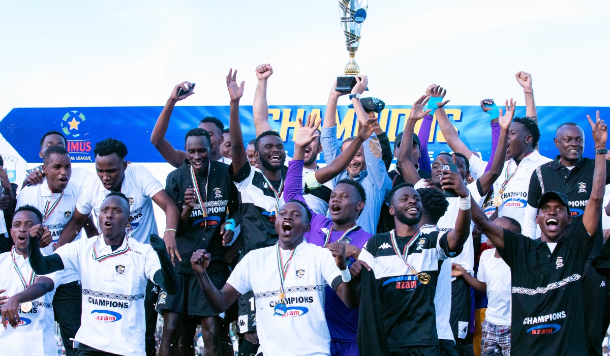 APR FC players and coaching staff celebrate the title as they are crown Primus National League Champions on Sunday, May 28. Photo by Craish BAHIZI