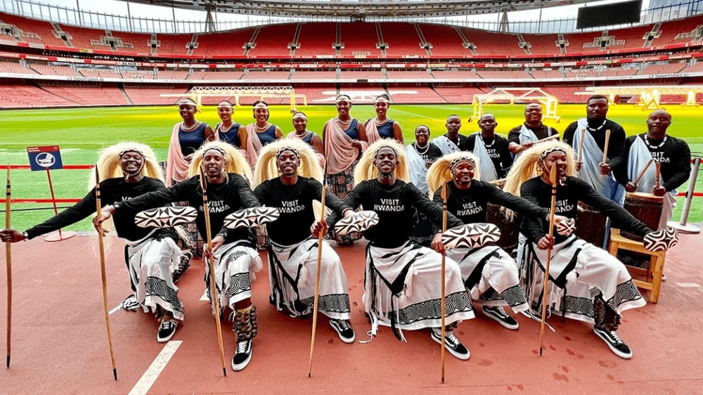 Urukerereza dancers pose for a photo at Emirates Stadium