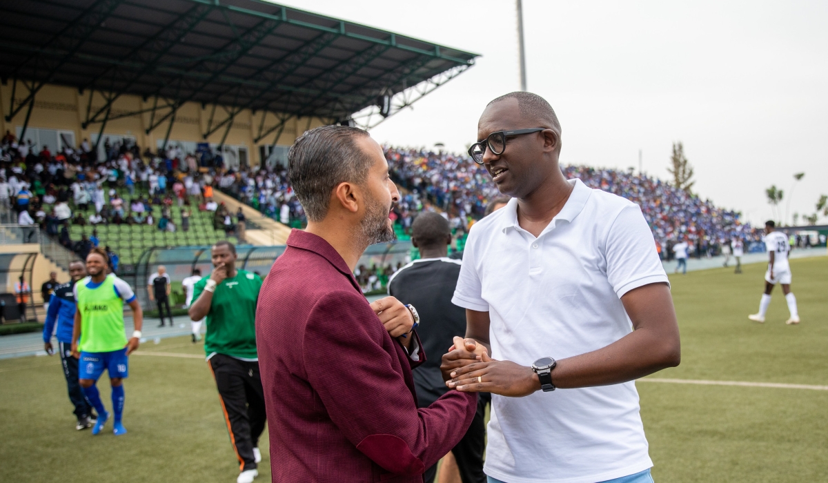 APR coach Ben Moussa chats with Rayon Sports caoach Haringingo. APR coach Ben  wants to win Saturday’s 2023 Peace Cup final against Rayon Sports to cap off the season with the cup and league title double.  Mugiwiza